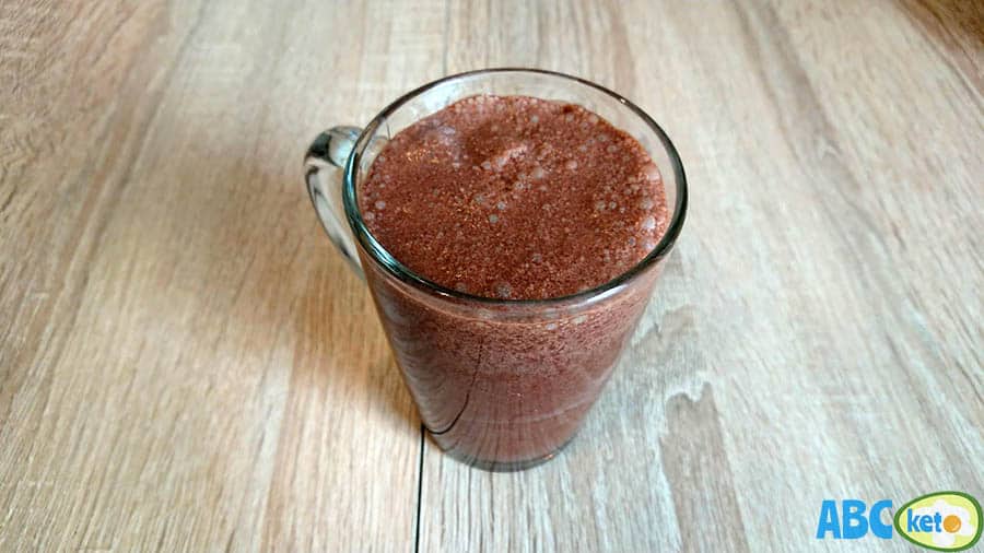 Keto chocolate milk after blending in a glass
