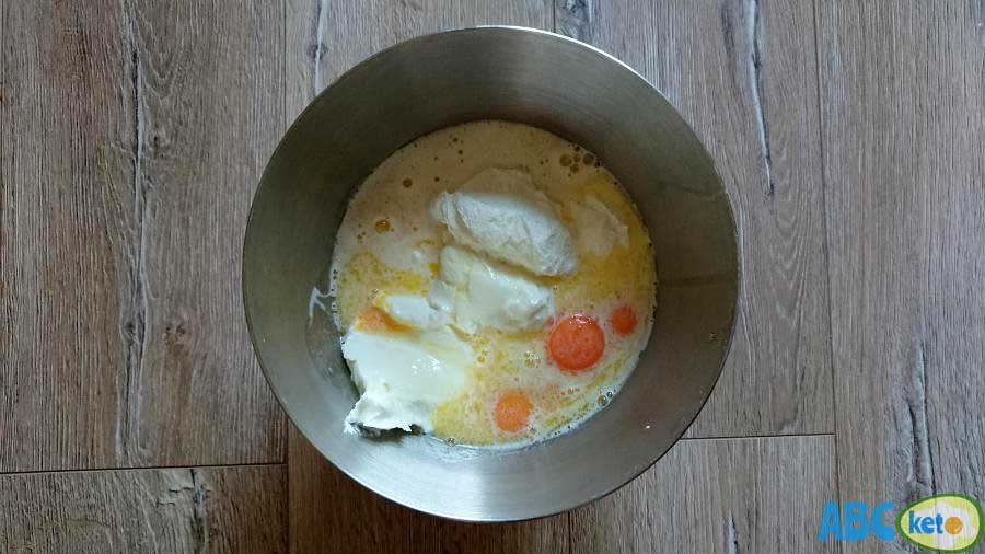 Simple keto cheesecake ingredients, cream cheese, butter, yolks