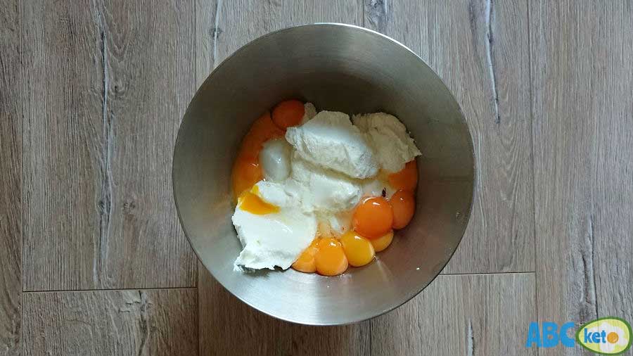 Simple keto cheesecake ingredients, cream cheese with egg yolks