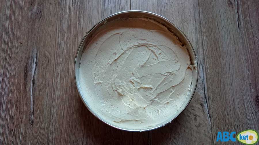 Keto peanut butter cheesecake recipe, adding filling on the crust